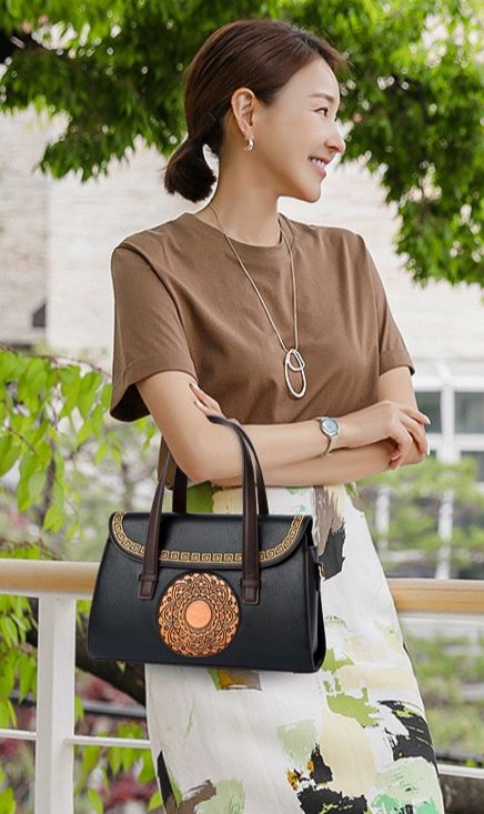 Imported PU Handbag – Premium Quality Structured Design with Artistic Detailing
