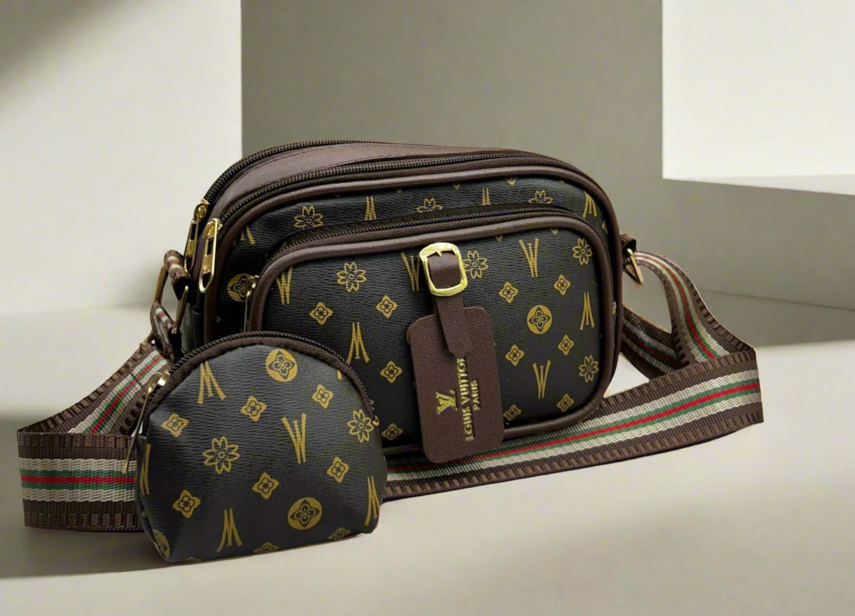 Louis Vuitton handbag with matching pouch on a light surface, featuring the brand logo.