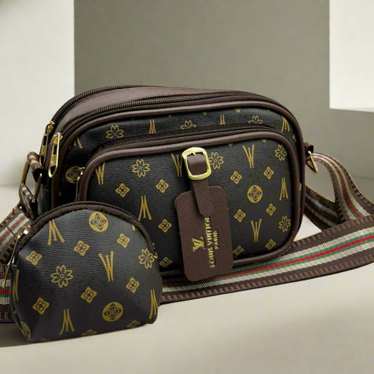 Designer handbag with matching pouch on a light background