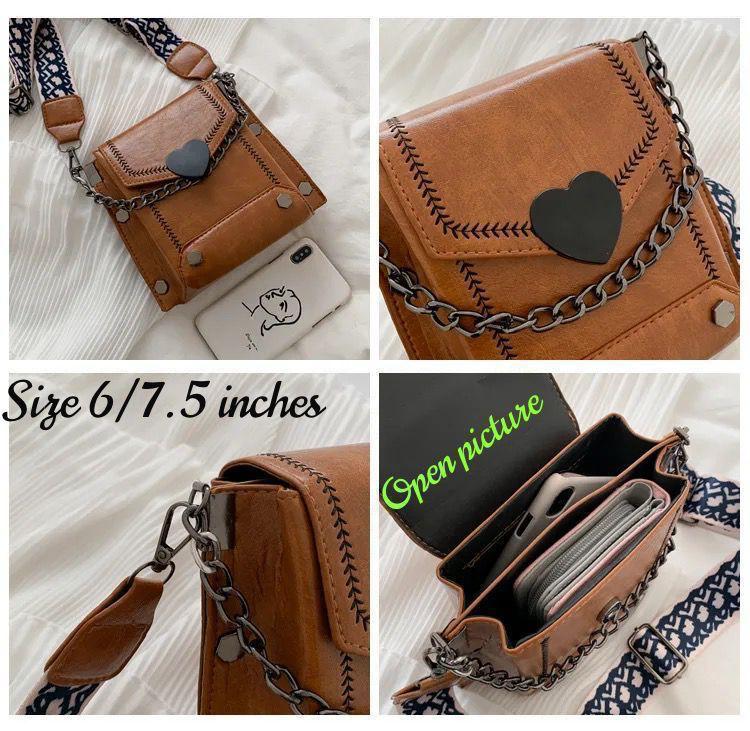 Brown leather purse with chain detail on a white background