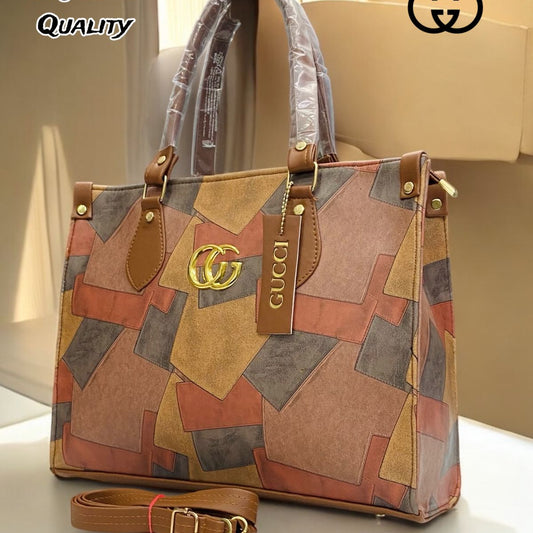 Gucci handbag with geometric pattern on a white surface, featuring the Gucci logo.