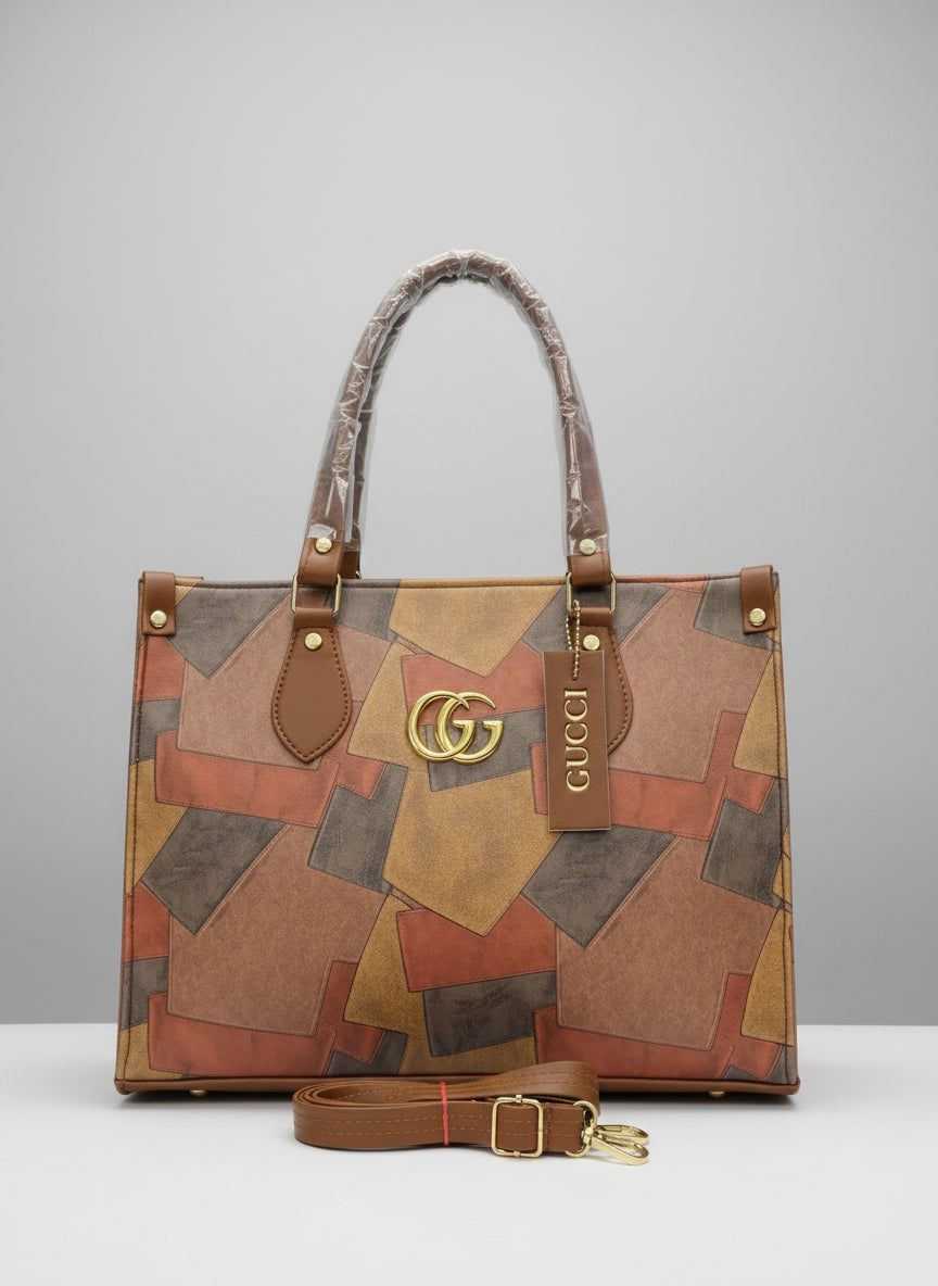 Gucci handbag with geometric pattern on a white surface, featuring the Gucci logo.