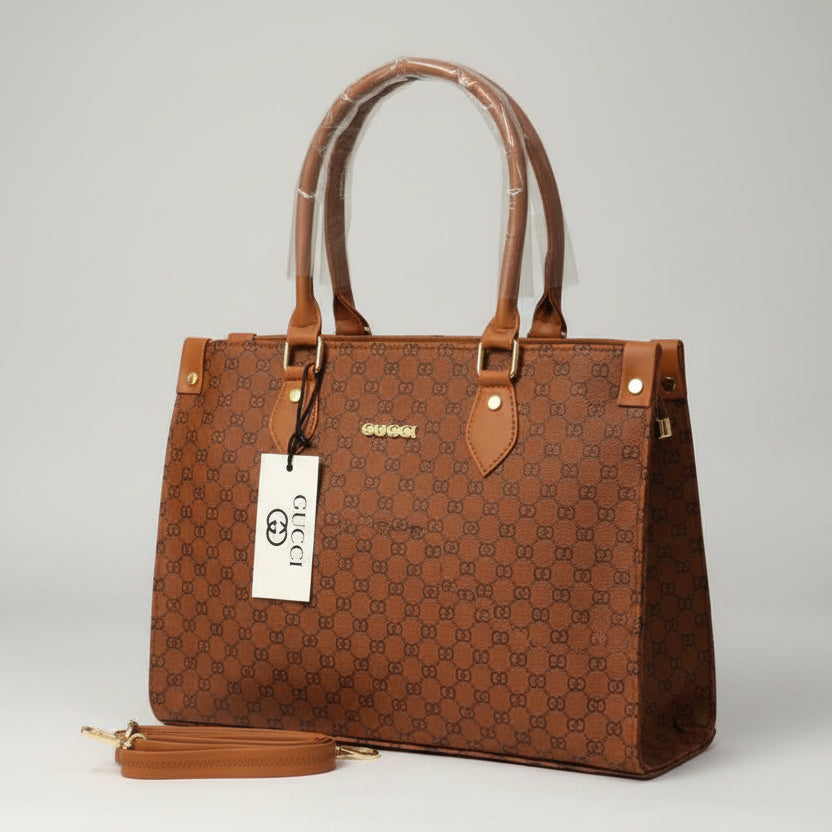 Brown patterned handbag with a visible brand tag on a light background