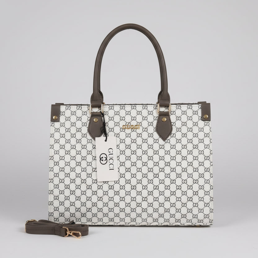 White Designer handbag with visible brand logo on a light background