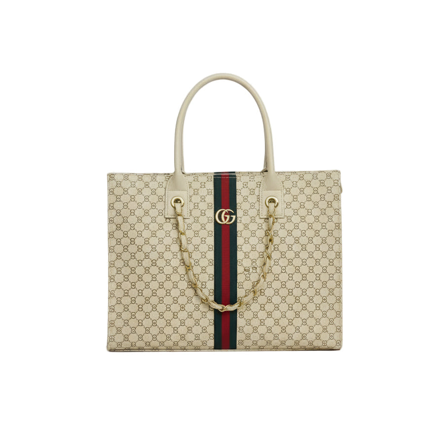White Gucci Structured Tote Bag Person holding a Gucci handbag with a visible brand logo on a white background