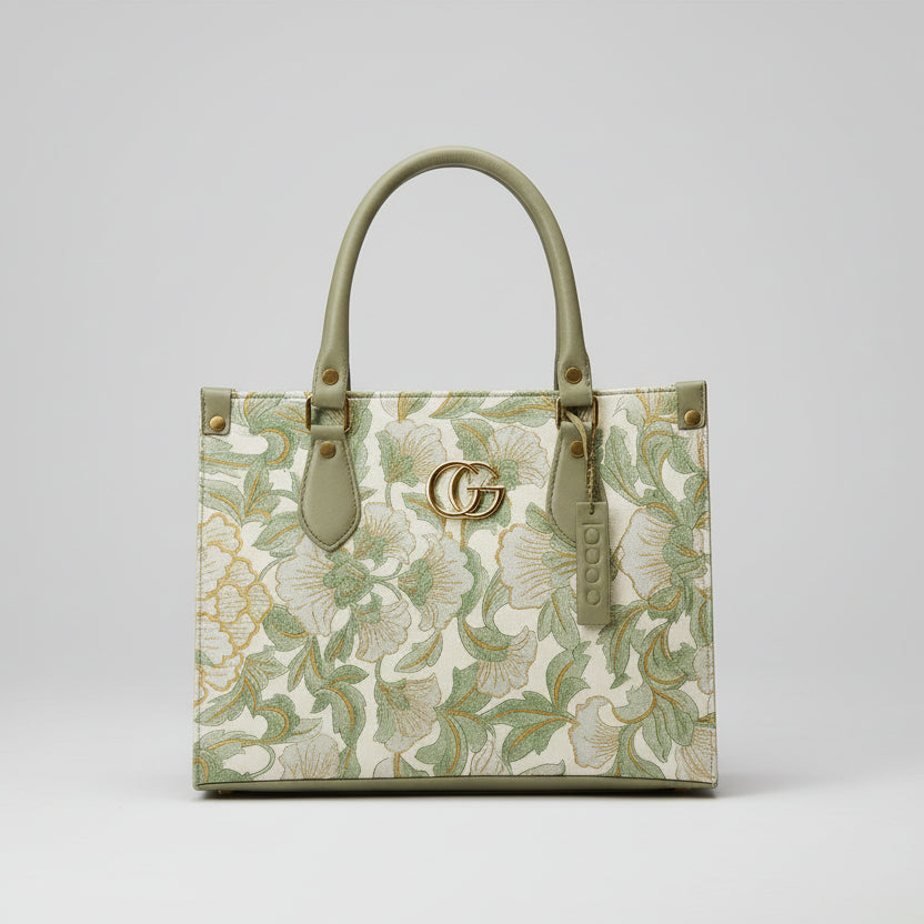 Floral patterned handbag with a brand logo on a neutral background