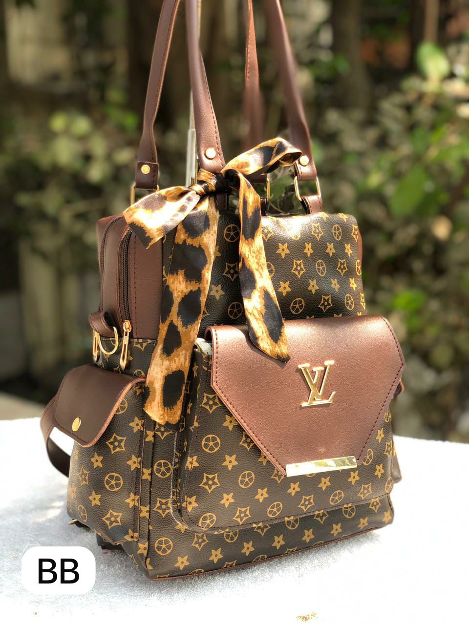 Louis Vuitton 2-in-1 Handbag & Backpack | Vegan PU Leather | Multi-Compartment | 10 x 12.5 inches