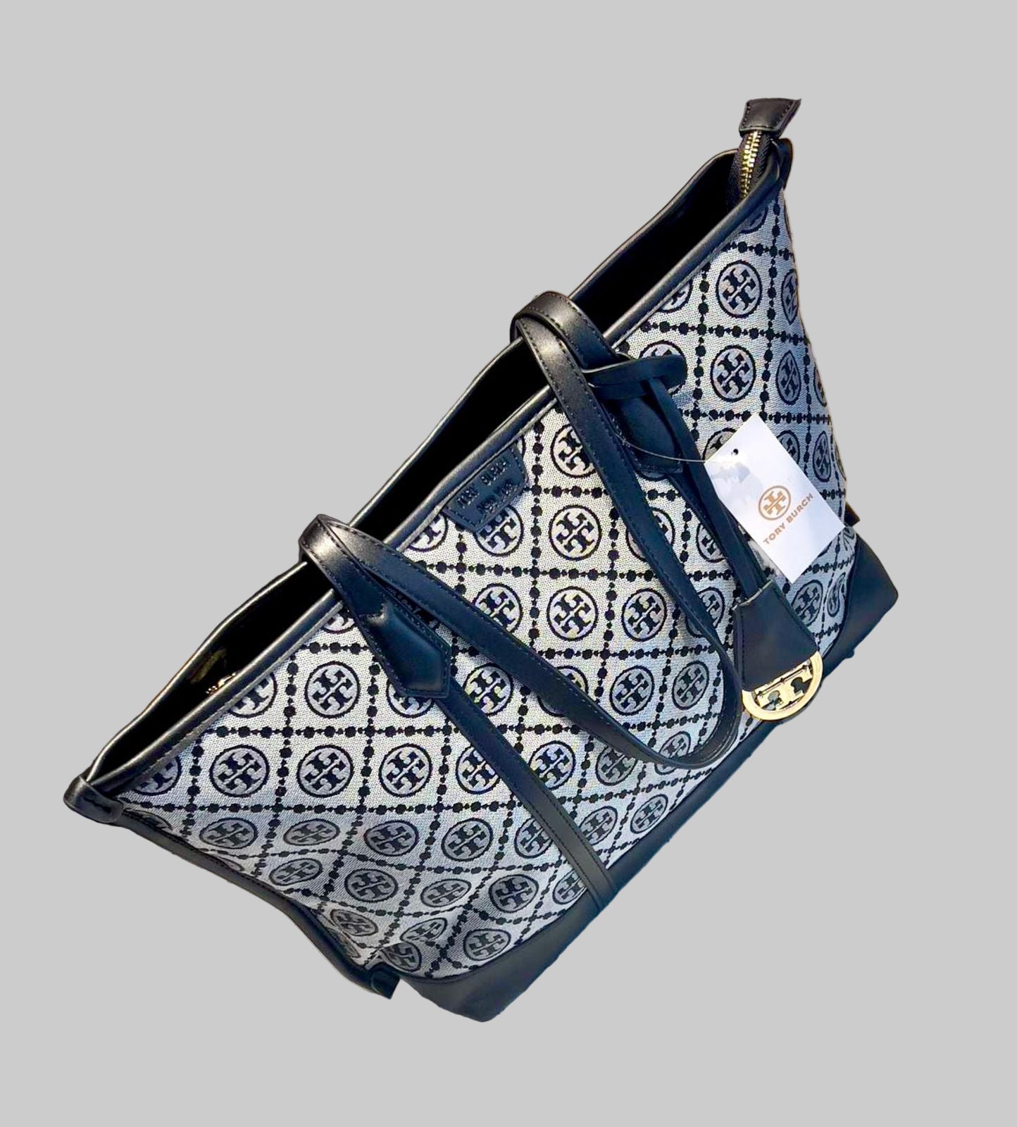 Patterned bag with a tag on a textured surface