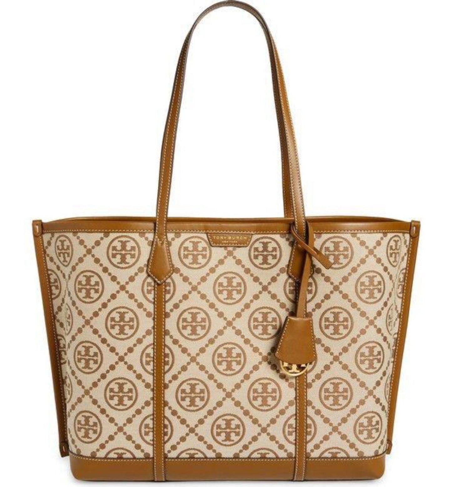 Tory Burch tote bag with logo pattern on beige background