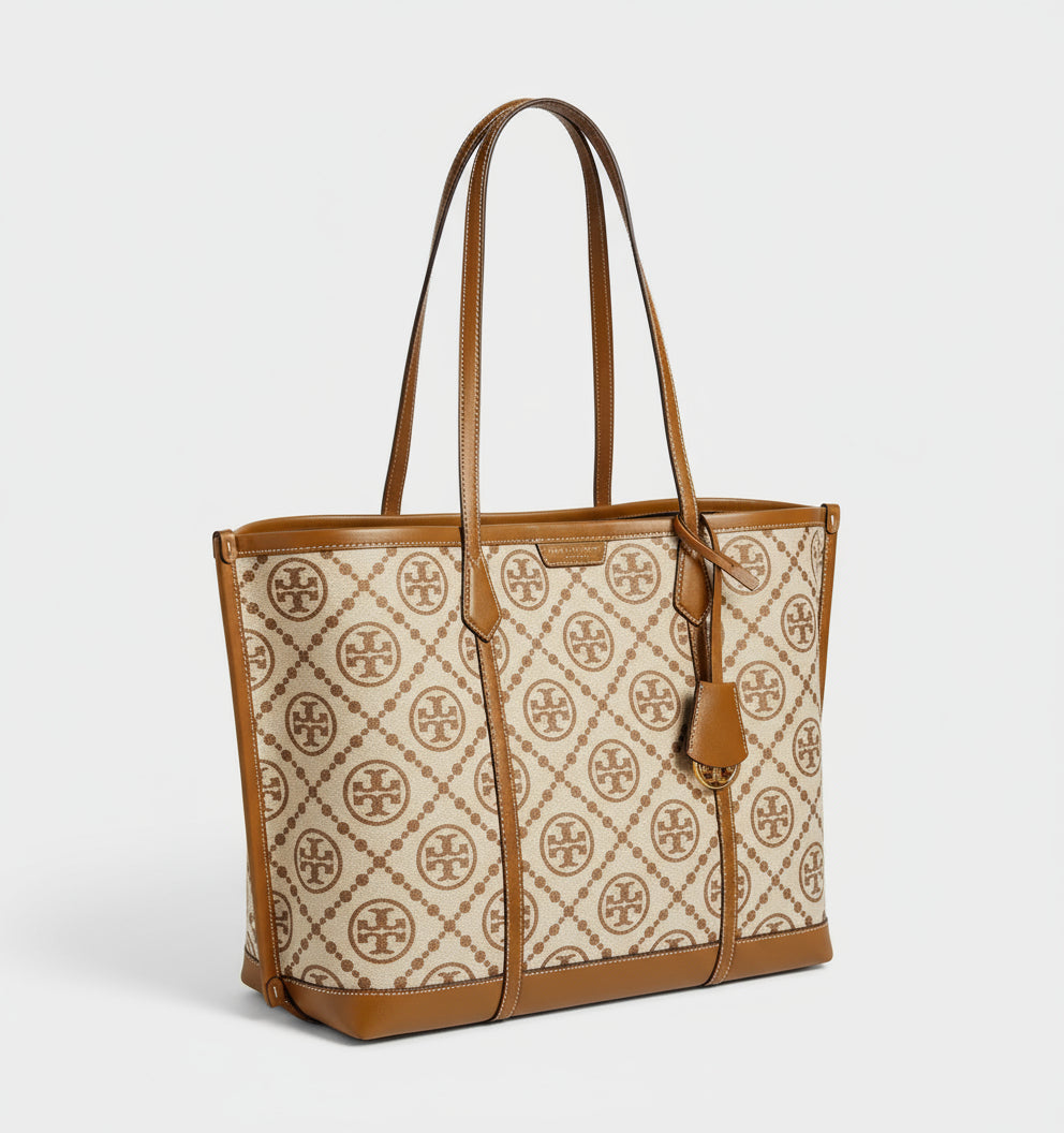 Tory Burch tote bag with logo pattern on beige background