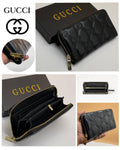 Black Luxury Gucci Women’s Long Wallet Gucci wallet with branding and design details on a white background