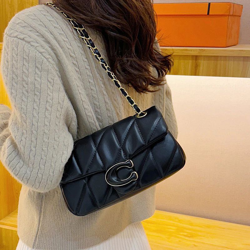 Black Coach Tabby quilted handbag