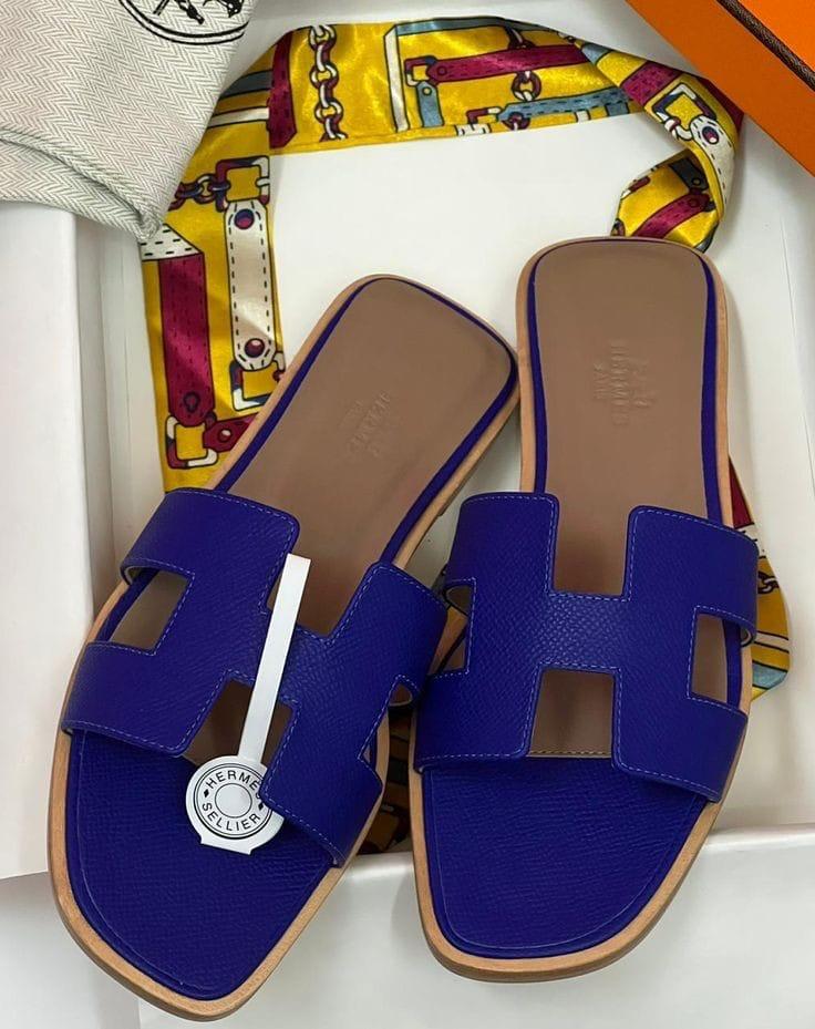 Blue HERMES Oran Velvet women  sandals with a logo on a white background