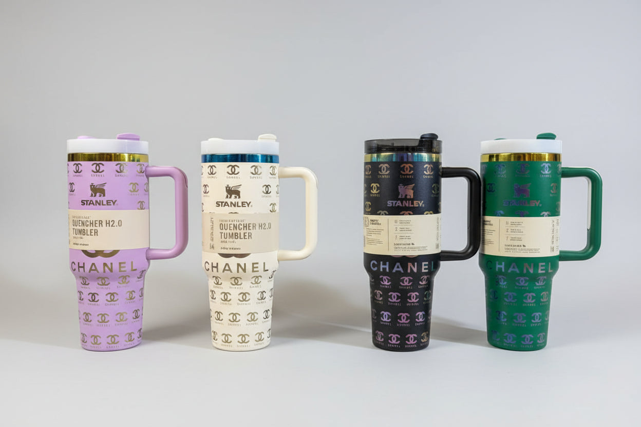Collection of colorful mugs with brand logos on a shelf in a store.