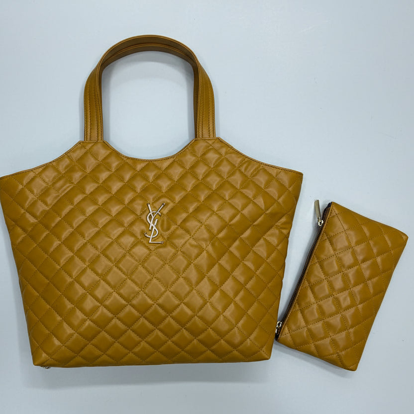 Gold YSL Big Size Tote Bag with Small Wallet Quilted brown handbag with a matching pouch on a wooden surface