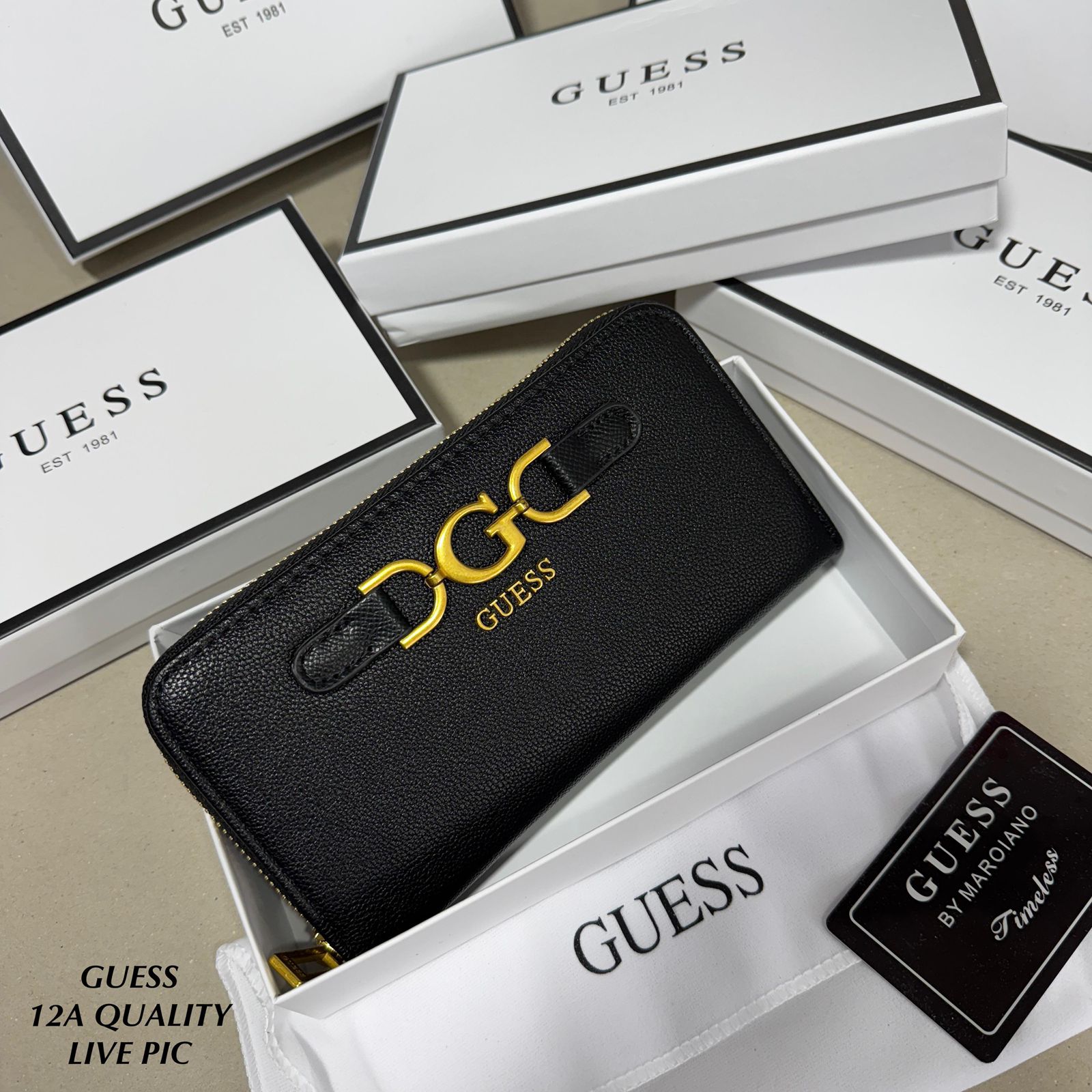 Black Premium Guess Big Size Zipper Wallet   Guess wallet with gold logo on a white Guess branded box