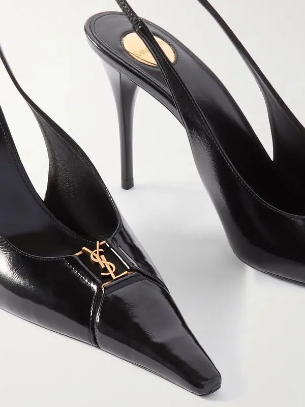 YSL Babylone Women’s Pumps Black high-heeled shoes with a gold logo on a white background