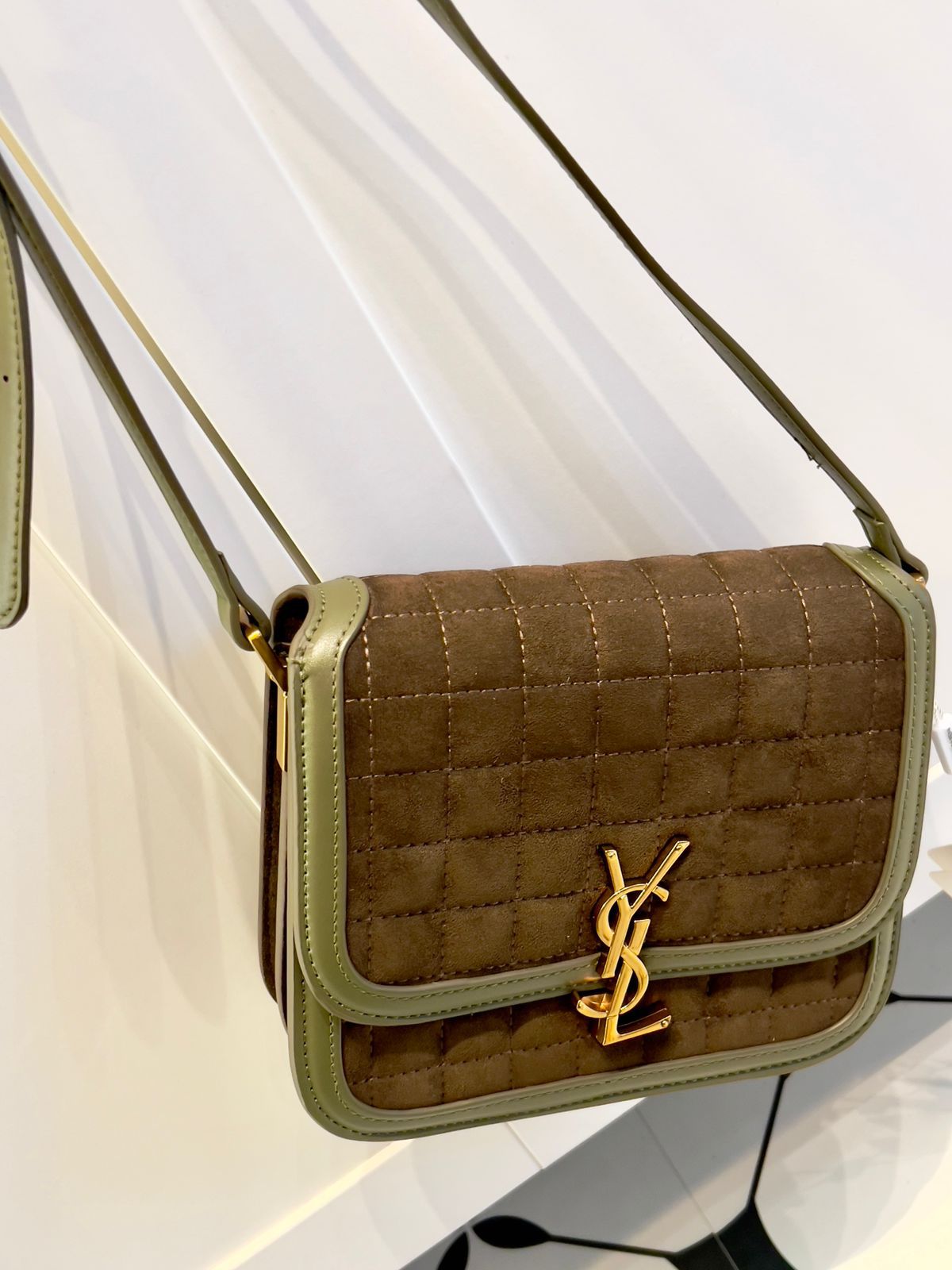 Tan Yves Saint Laurent YSL Premium Shoulder Bag quilted handbag with a gold logo on a white background