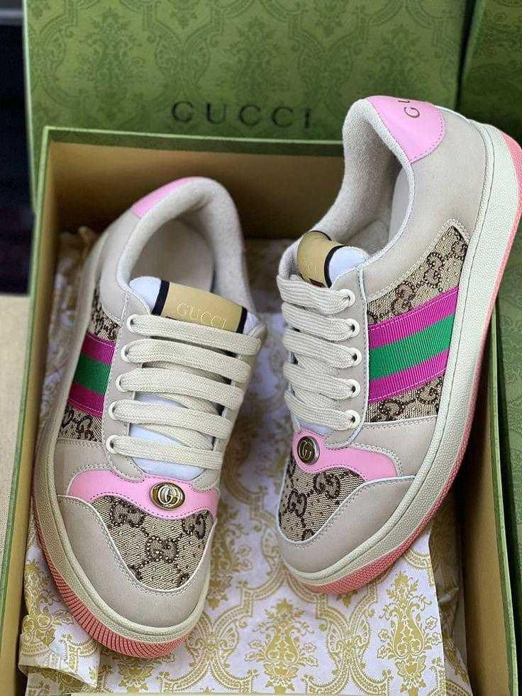 Gucci Women’s Premium Sneakers Gucci sneakers with pink and green accents on a patterned box