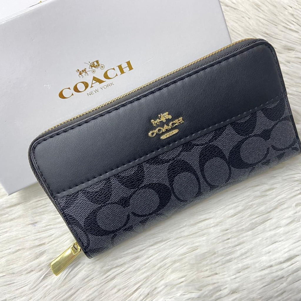 Black Coach High-Quality Handy Wallet Coach wallet with logo on a light gray background
