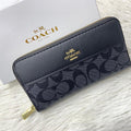 Black Coach High-Quality Handy Wallet Coach wallet with logo on a light gray background