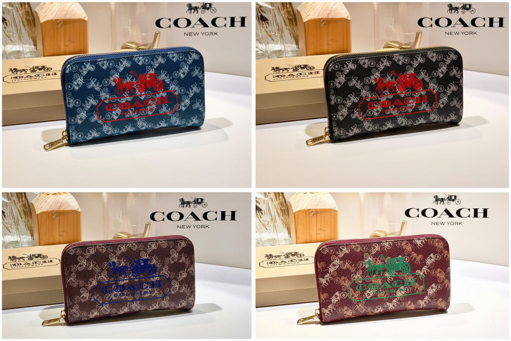 Four Coach wallets with different designs on a white background
