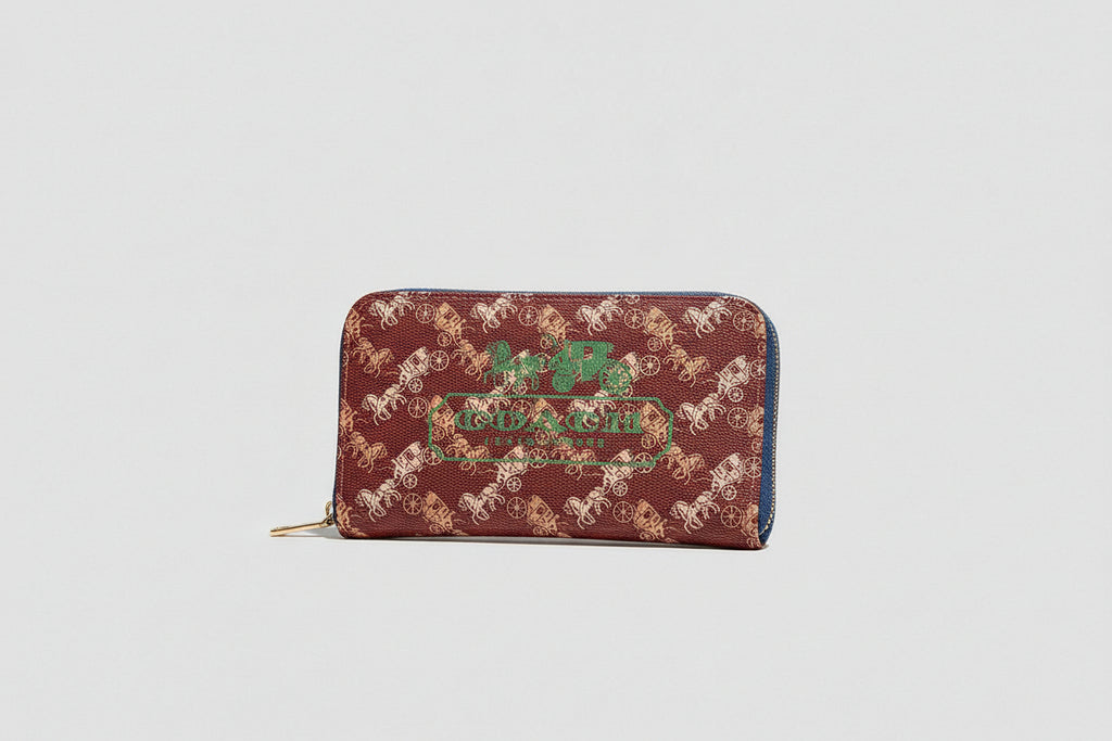 Red Coach Charter Signature Wallets for Women patterned wallet with gold accents on a Coach branded box.