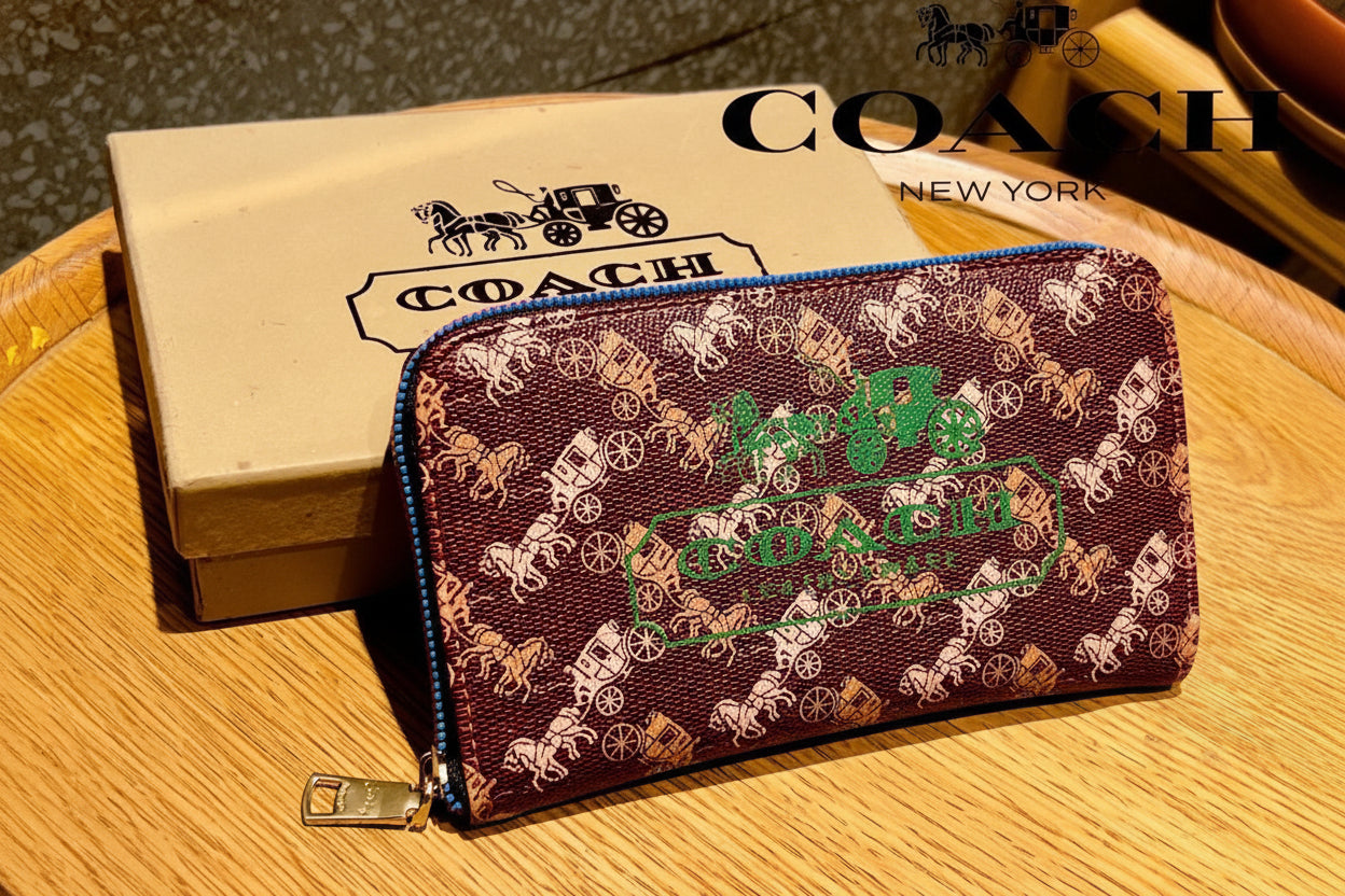 Red Coach Charter Signature Wallets for Women Coach wallet with brand logo on a wooden surface