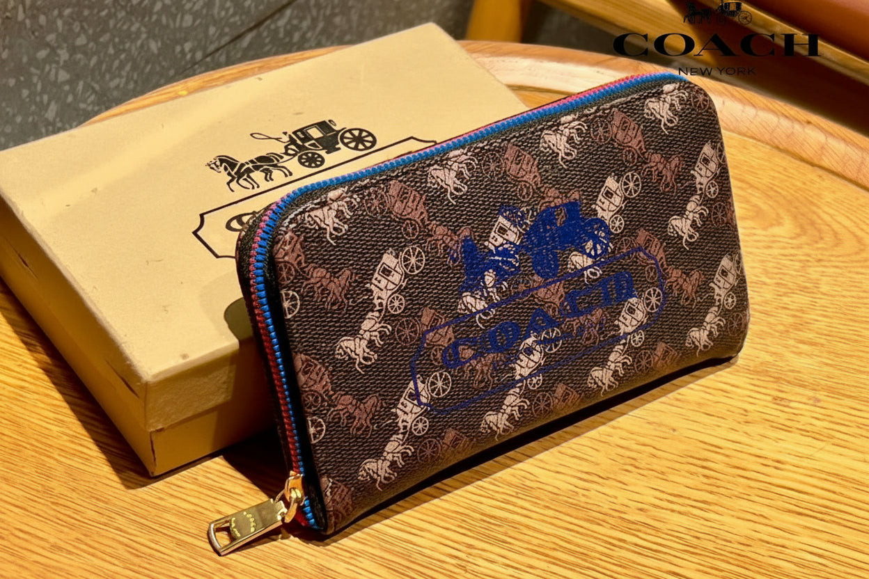 Brown Coach Charter Signature Wallets for Women Coach wallet with brand logo on a wooden surface