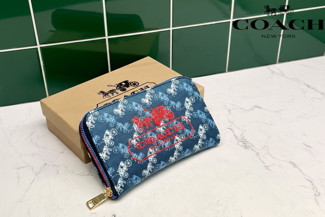 Blue Coach Charter Signature Wallets for Women Coach pouch with logo on a white surface with green tiled wall background