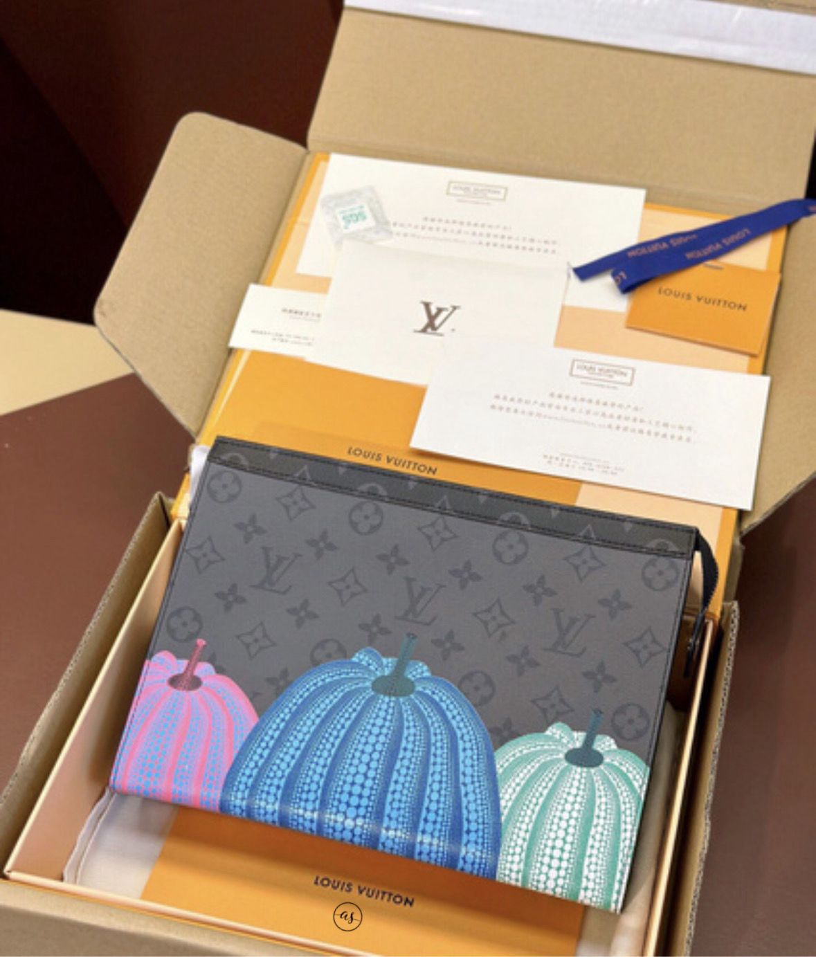 Louis Vuitton Unisex Reverse Pochette Louis Vuitton wallet with pumpkin design in a box