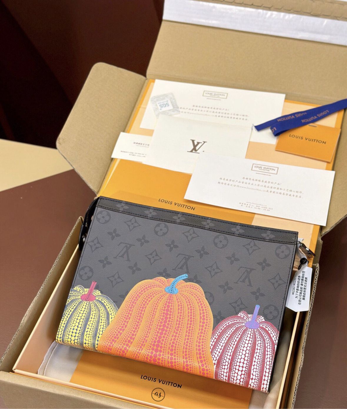Louis Vuitton Unisex Reverse Pochette Louis Vuitton pouch with pumpkin design in a box