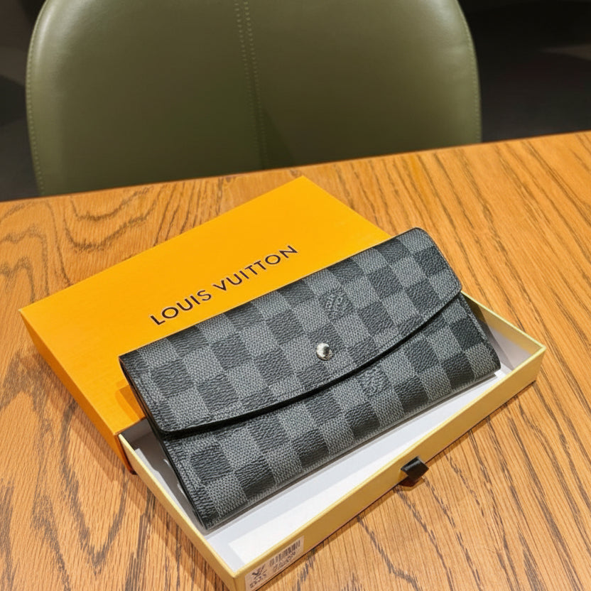 Louis Vuitton Women Wallet in a box on a wooden surface