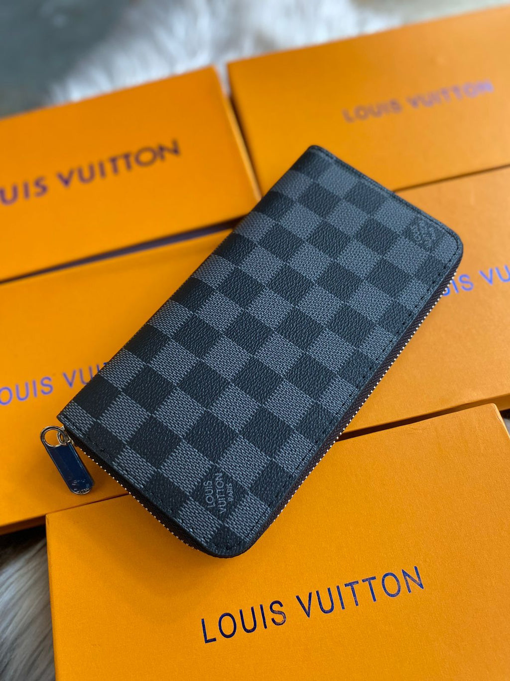 Blue checkered Louis Vuitton Premium Zipper Wallet on Louis Vuitton packaging